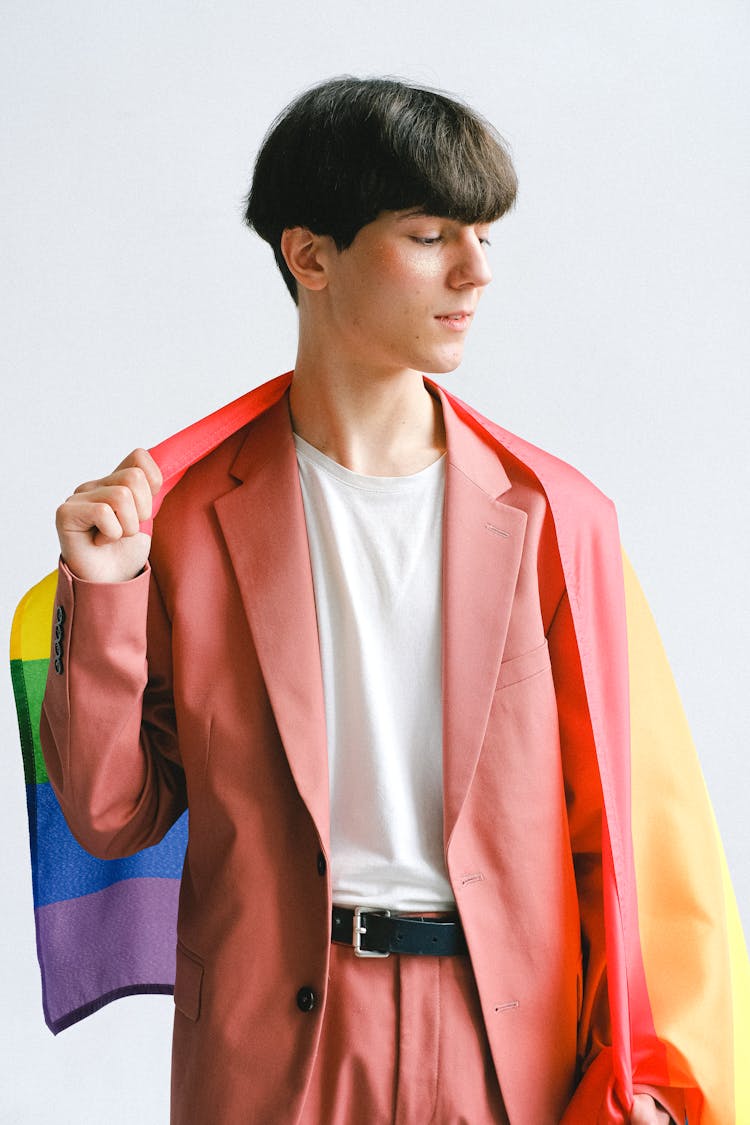 Man Holding A Gay Pride Flag