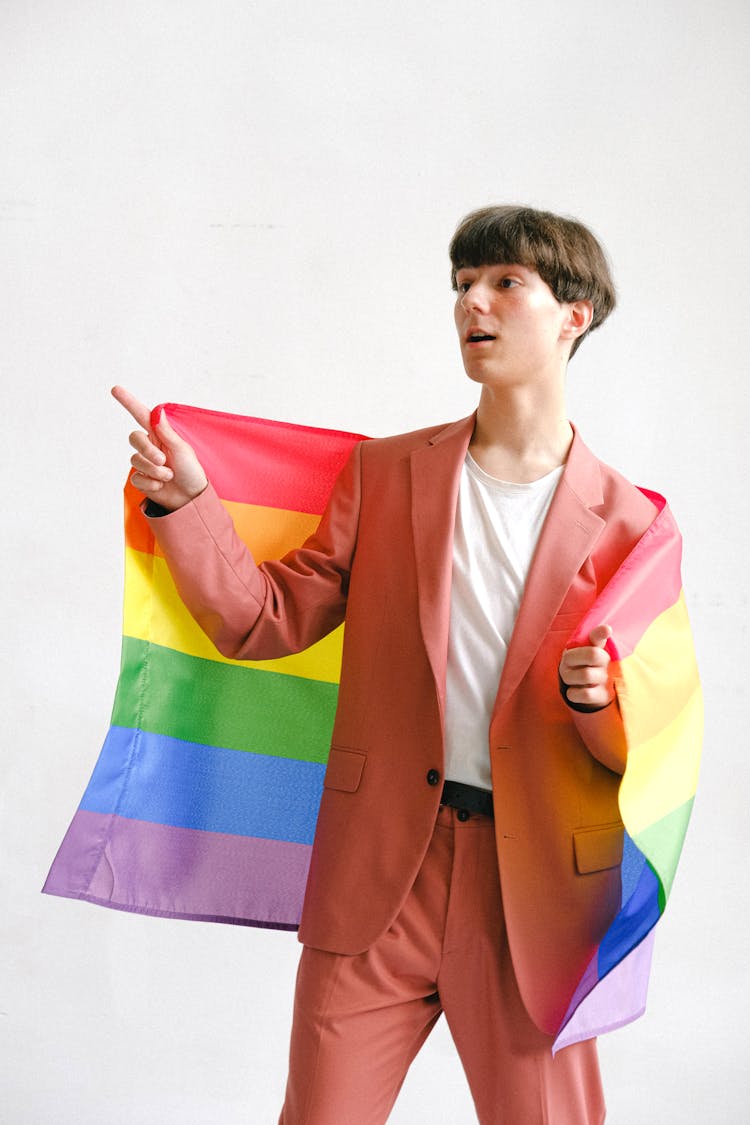 Man Holding A Gay Pride Flag