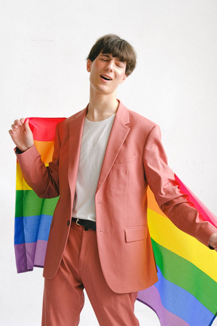 Man Holding A Gay Pride Flag