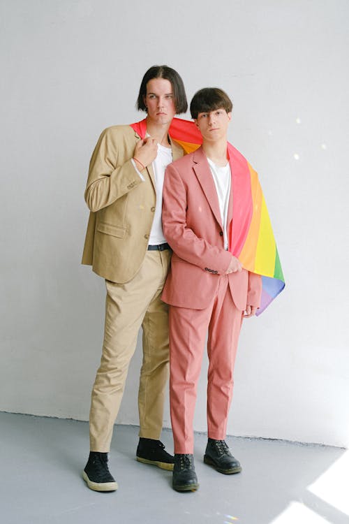 Two Men Holding a Gay Pride Flag
