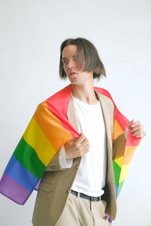 Man Holding a Gay Pride Flag