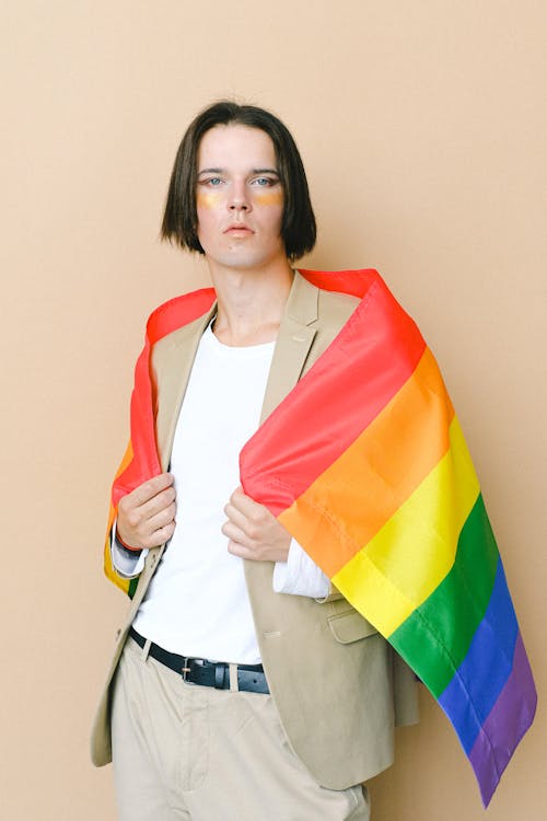 Man Holding a Gay Pride Flag