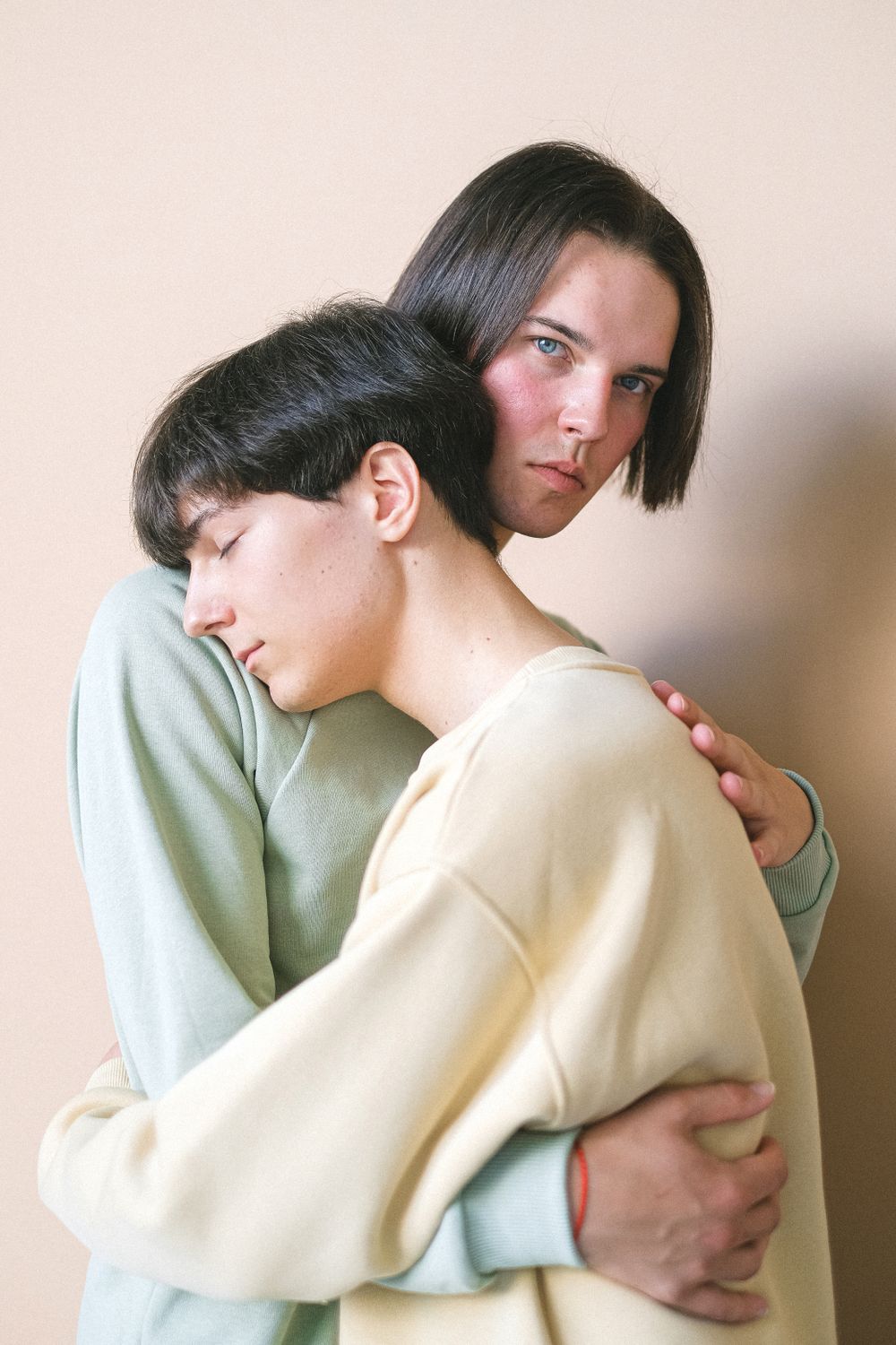 Hugging Sweater Men in Long Sleeve Sweaters Hugging · Free Stock Photo