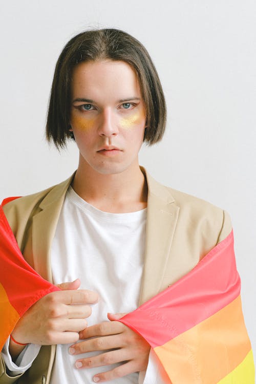 Man Holding a Gay Pride Flag