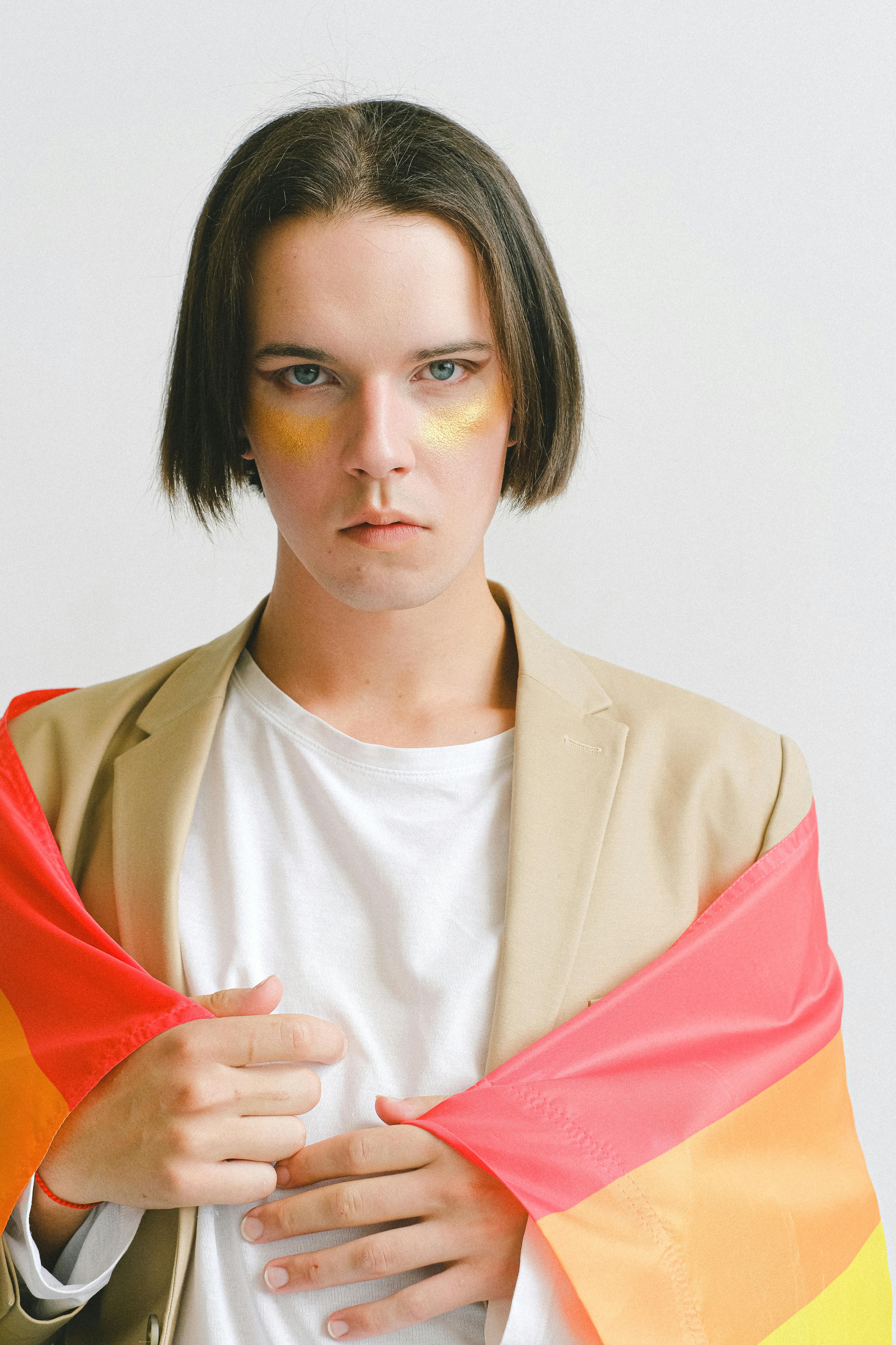 Man Holding a Gay Pride Flag · Free Stock Photo