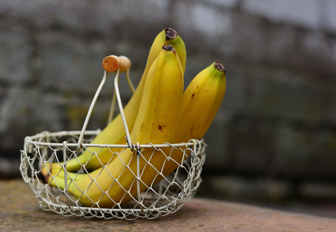 Three Banana on Gray Wire Basket