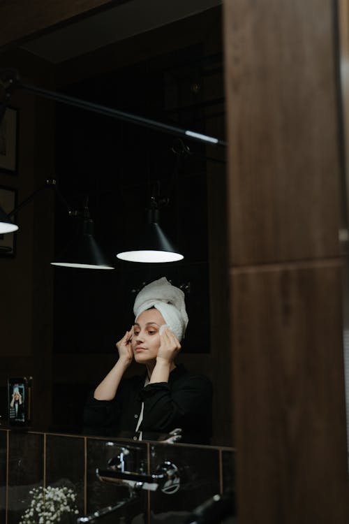 Man in Black Jacket Wearing White Cap