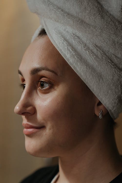 Free Woman With White Towel on Head Stock Photo