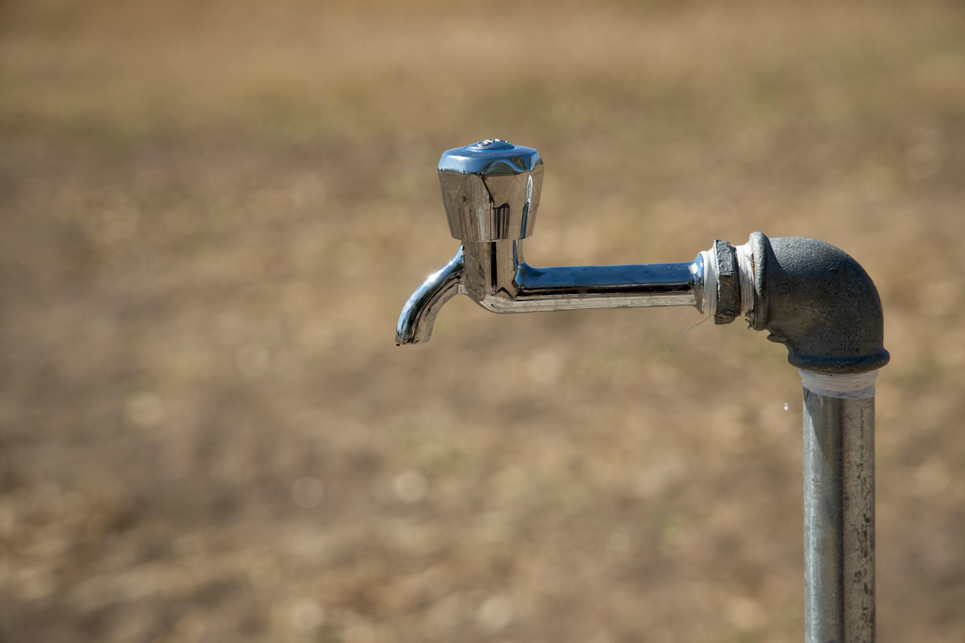 Close Up Photo of Steel Tap Faucet