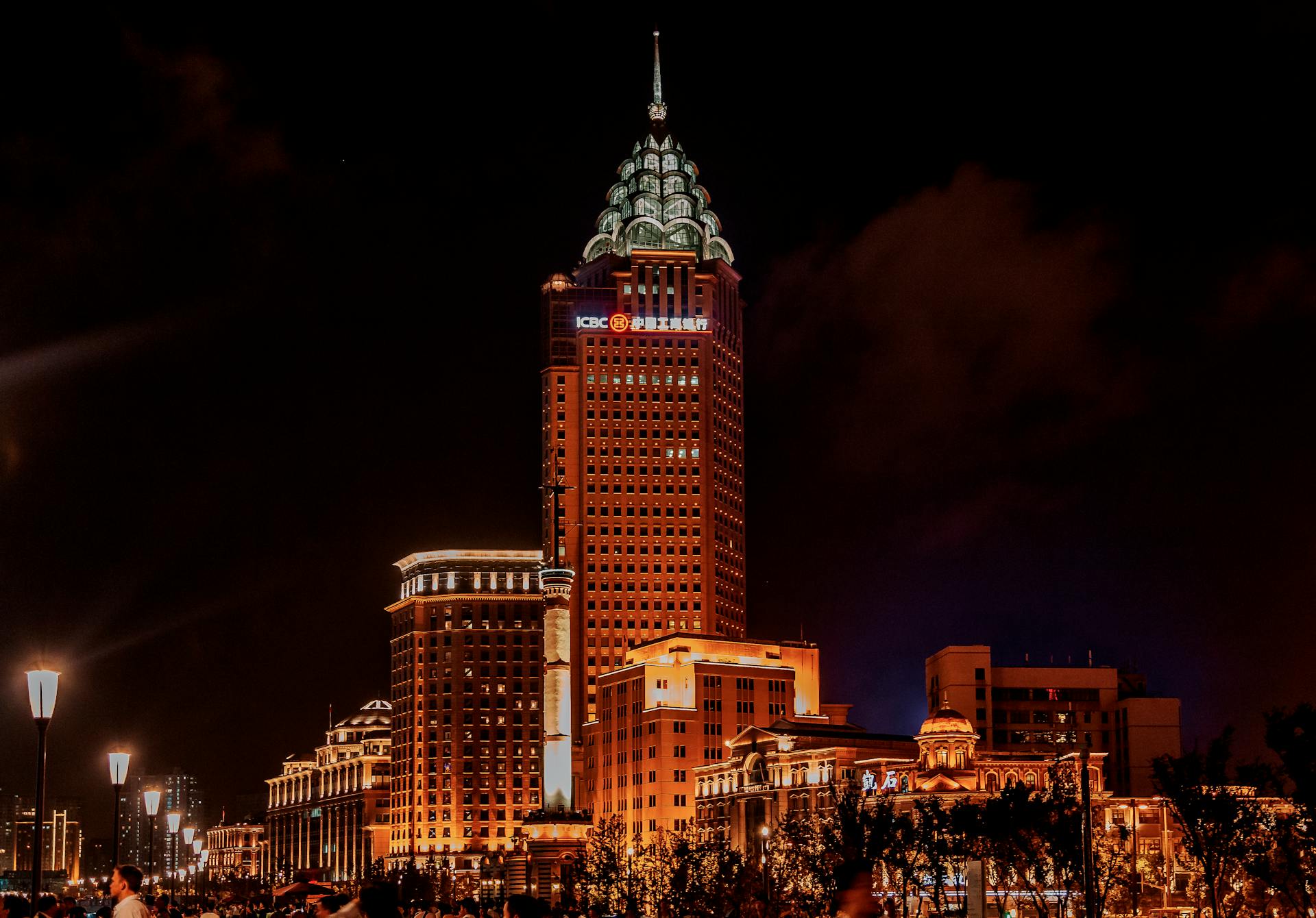 Stunning view of Shanghai's ICBC tower illuminated at night, showcasing modern architecture.