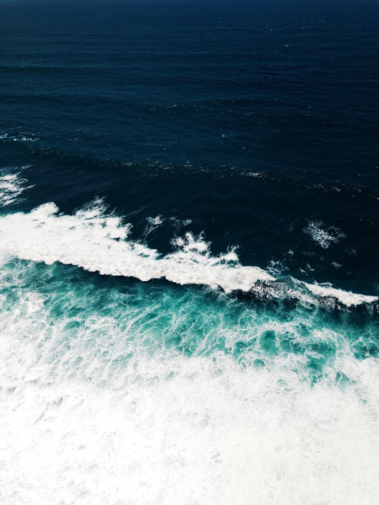 Bright Foamy Ocean Waves In Stormy Weather