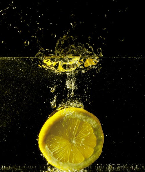 Free Yellow Lime Submerged in Water Stock Photo