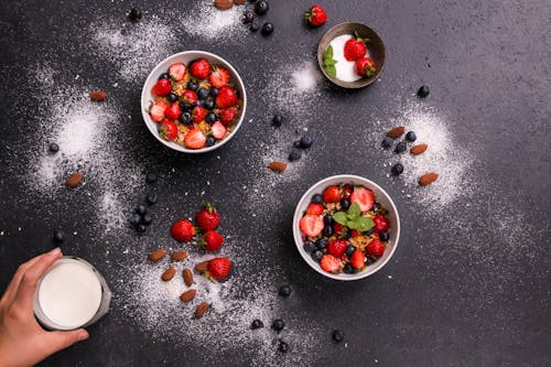 Slices of Strawberries in Bowls