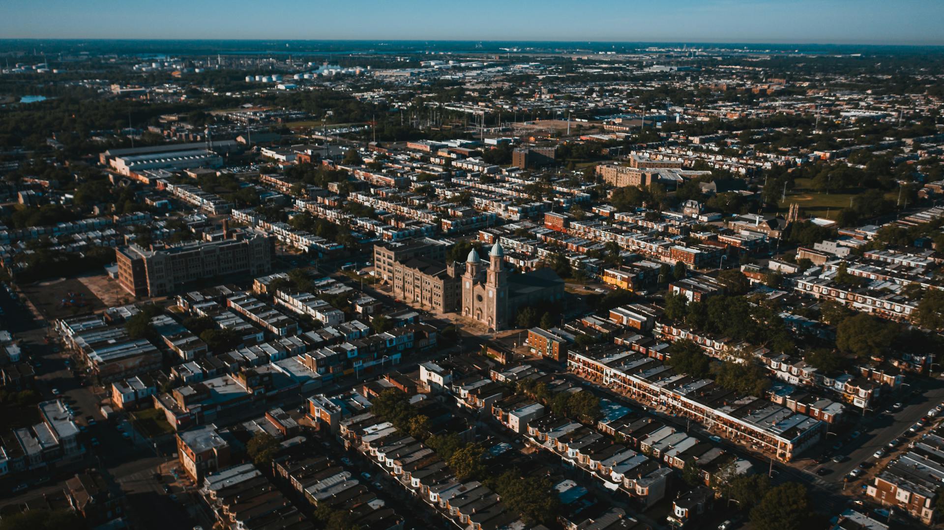 Explore the sprawling urban landscape of Philadelphia with this stunning aerial view showcasing architecture and city life.