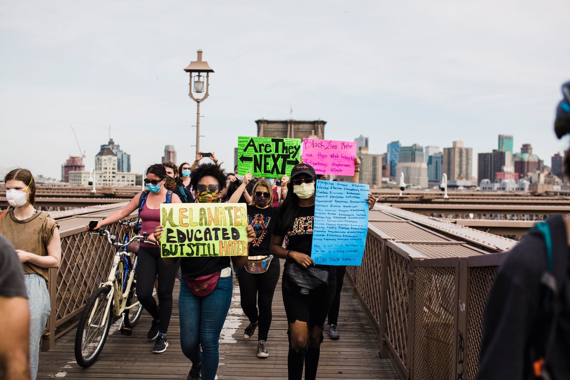 Protesters Holding Signs