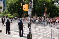 Crowd of Protesters Holding Signs