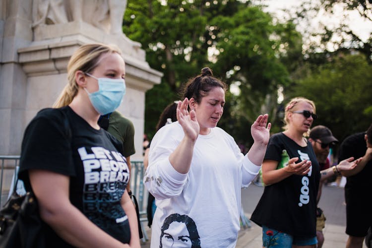 Women Praying Outside