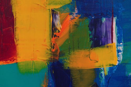Free A colorful abstract painting with vivid brushstrokes in acrylic on canvas. Stock Photo