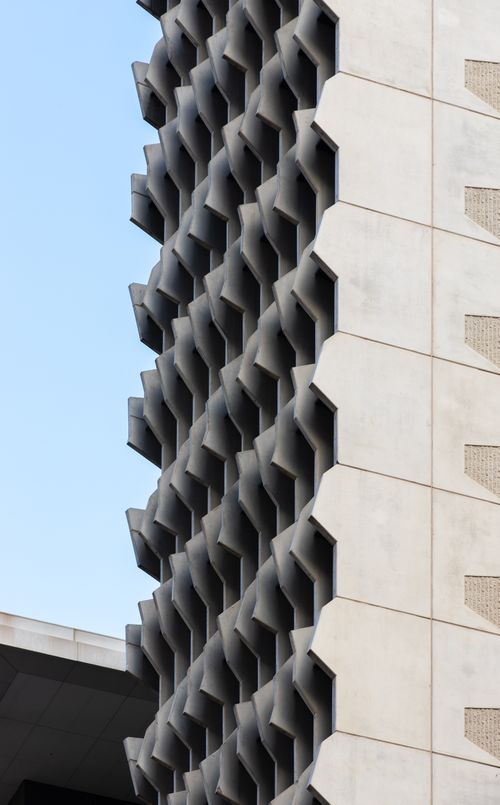 Free Close-up of a modern architectural facade with intricate geometric designs in Melbourne, Australia. Stock Photo