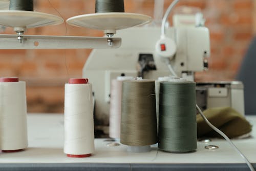 White and Silver Thread Spool