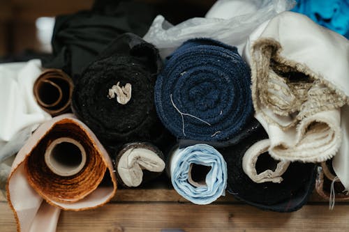 Blue Yarn on Brown Wooden Table