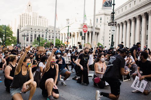 Free Crowd of Protesters Kneeling Stock Photo