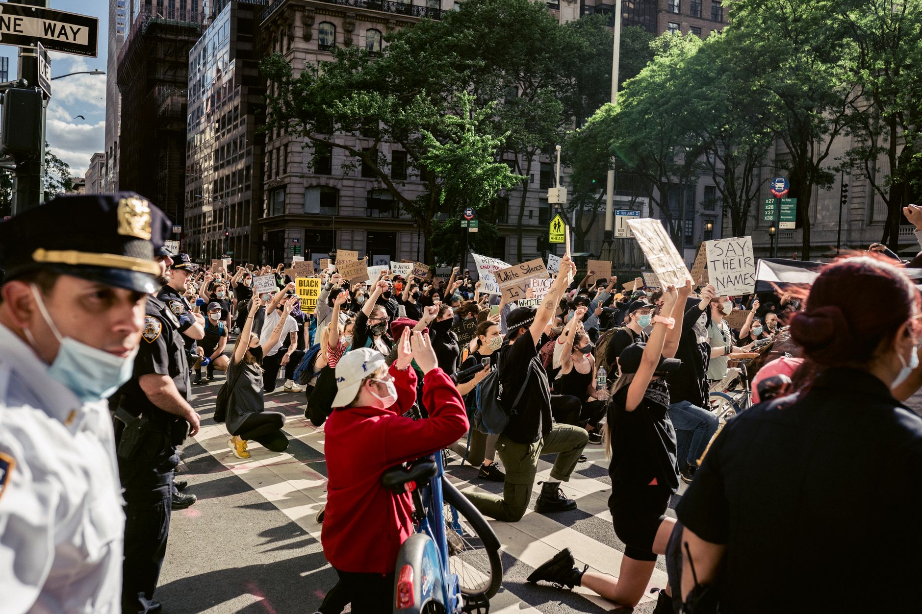 Crowd of Protesters Holding Signs and Kneeling · Free Stock Photo