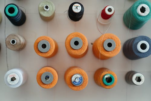 Three Brown Blue and Red Rolled Thread