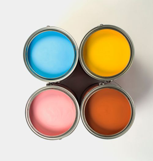 Free Top view of metal cans with collection of bright paints with smooth surface on white background Stock Photo