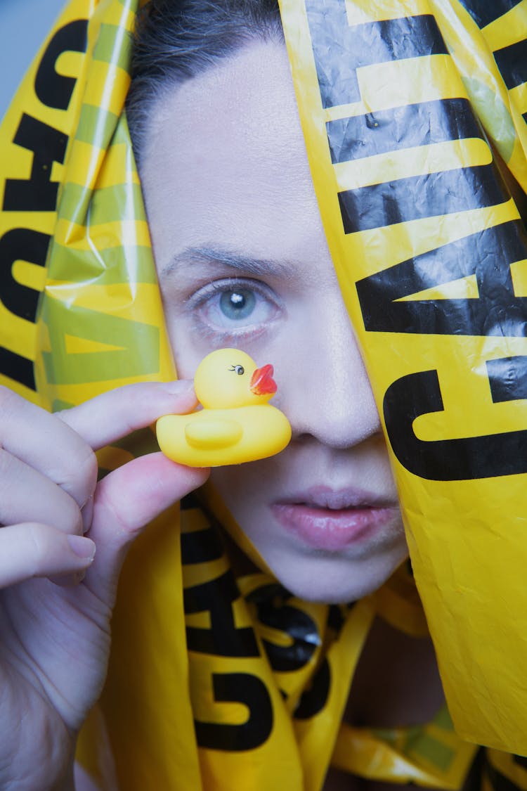 Person Holding Yellow Rubber Duck