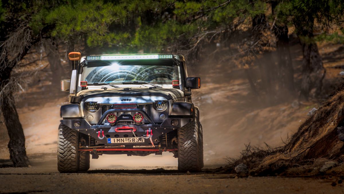 Jeep Wrangler on a dirt road