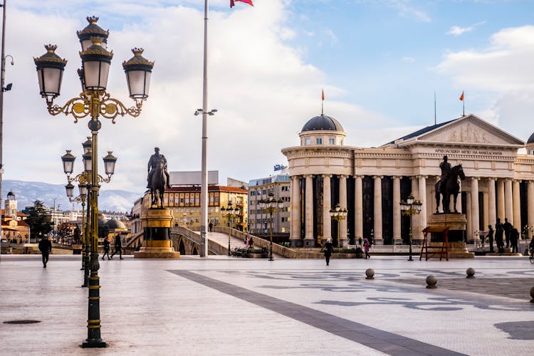 Square With Sculptures And Old National Museum In Macedonia