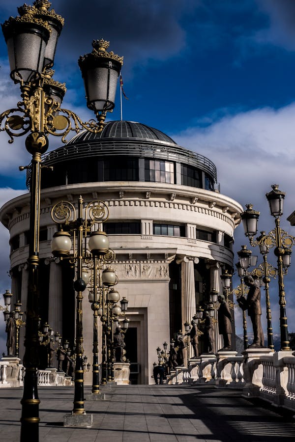 Art Bridge and old building facade in Skopje