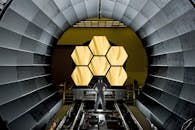 Man Standing on Stainless Steel Filamend