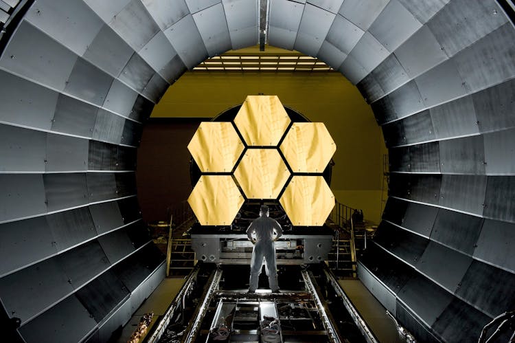 Man Standing On Stainless Steel Filamend