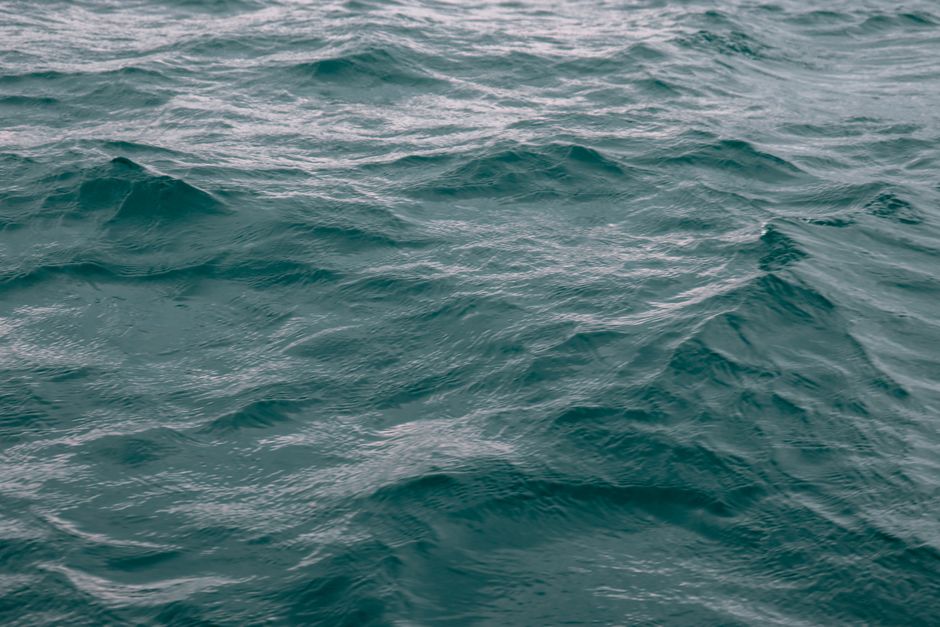 From above of water of rippling sea waves waving in gloomy weather