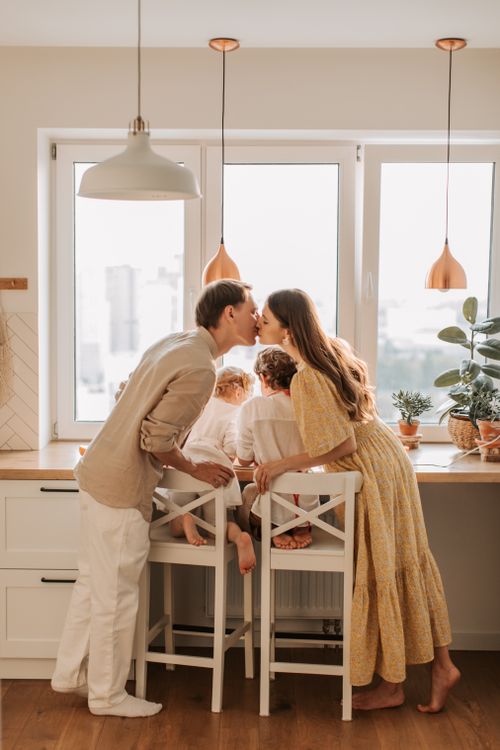 Free A joyful family shares a tender moment together, capturing love and unity. Stock Photo
