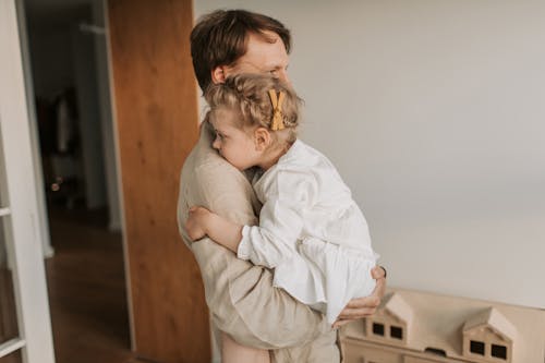 Free Father Carrying his Daughter Stock Photo