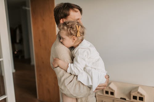 Father Carrying his Daughter