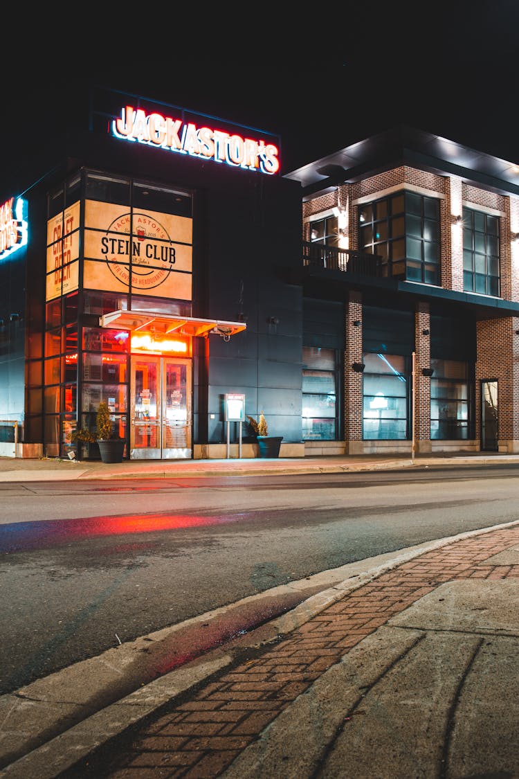 City Empty Street With Modern Illuminated Building At Night