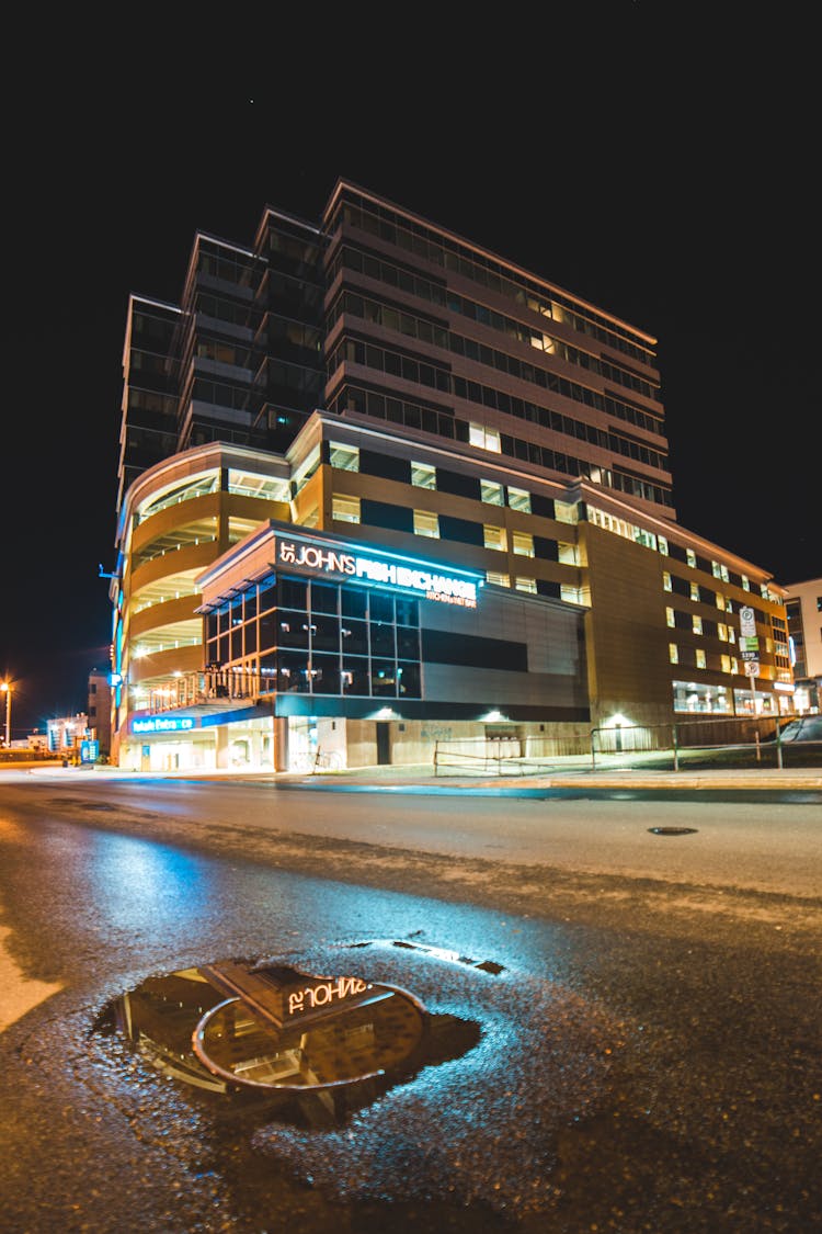 Facade Of Stylish Geometric Building At Night