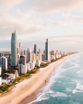 Stunning aerial view of Surfers Paradise, showcasing skyscrapers along Queensland's famous beach.