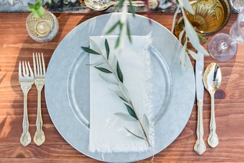 White and Green Leaf Decoration On Round Plate