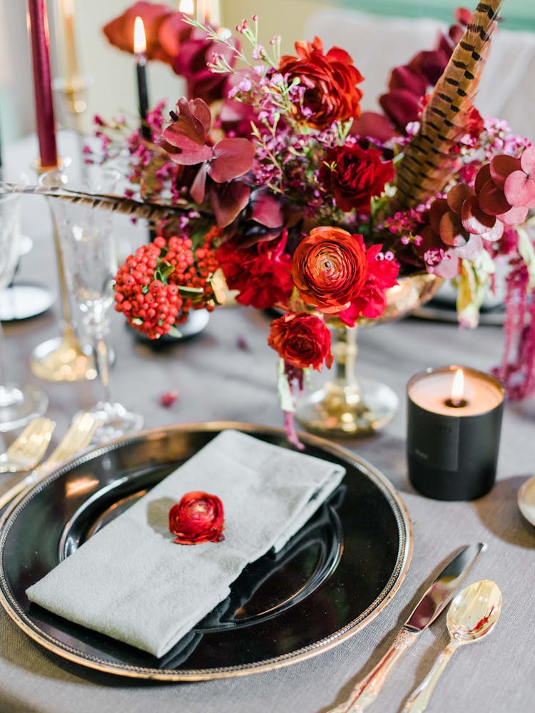 Bouquet Of Red Flowers On Table