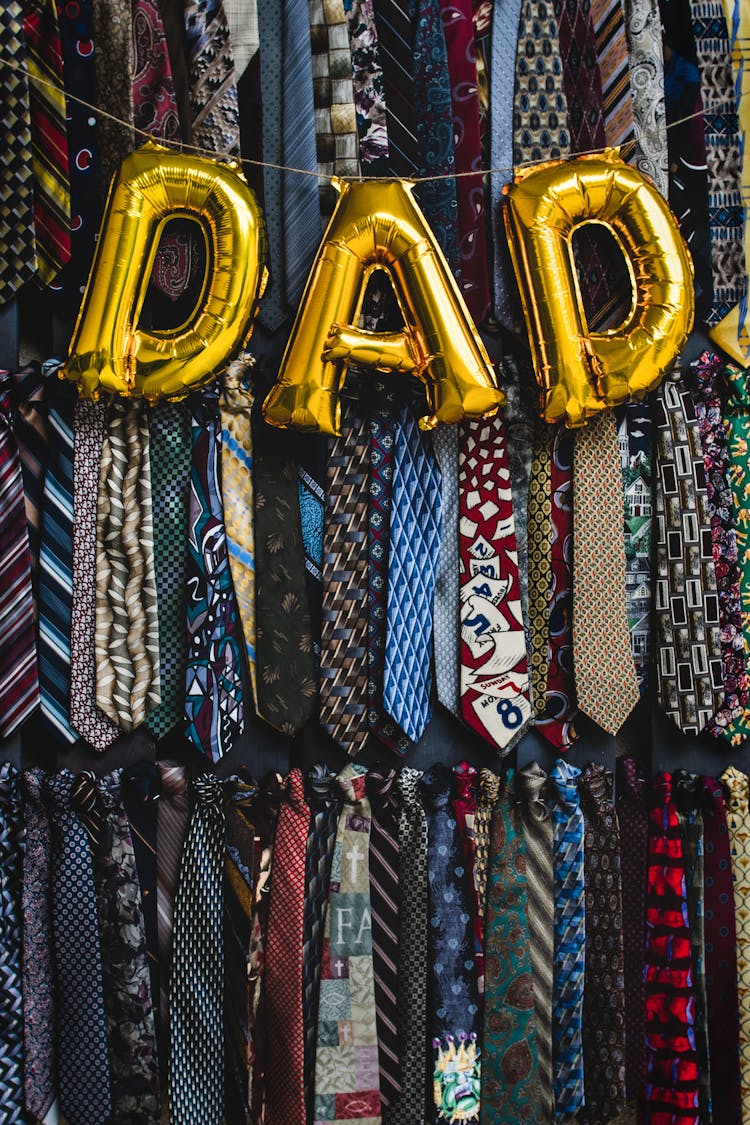 The Word Dad In Golden Letter Balloons 