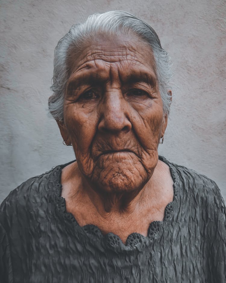 Melancholic Old Woman With Wrinkled Face