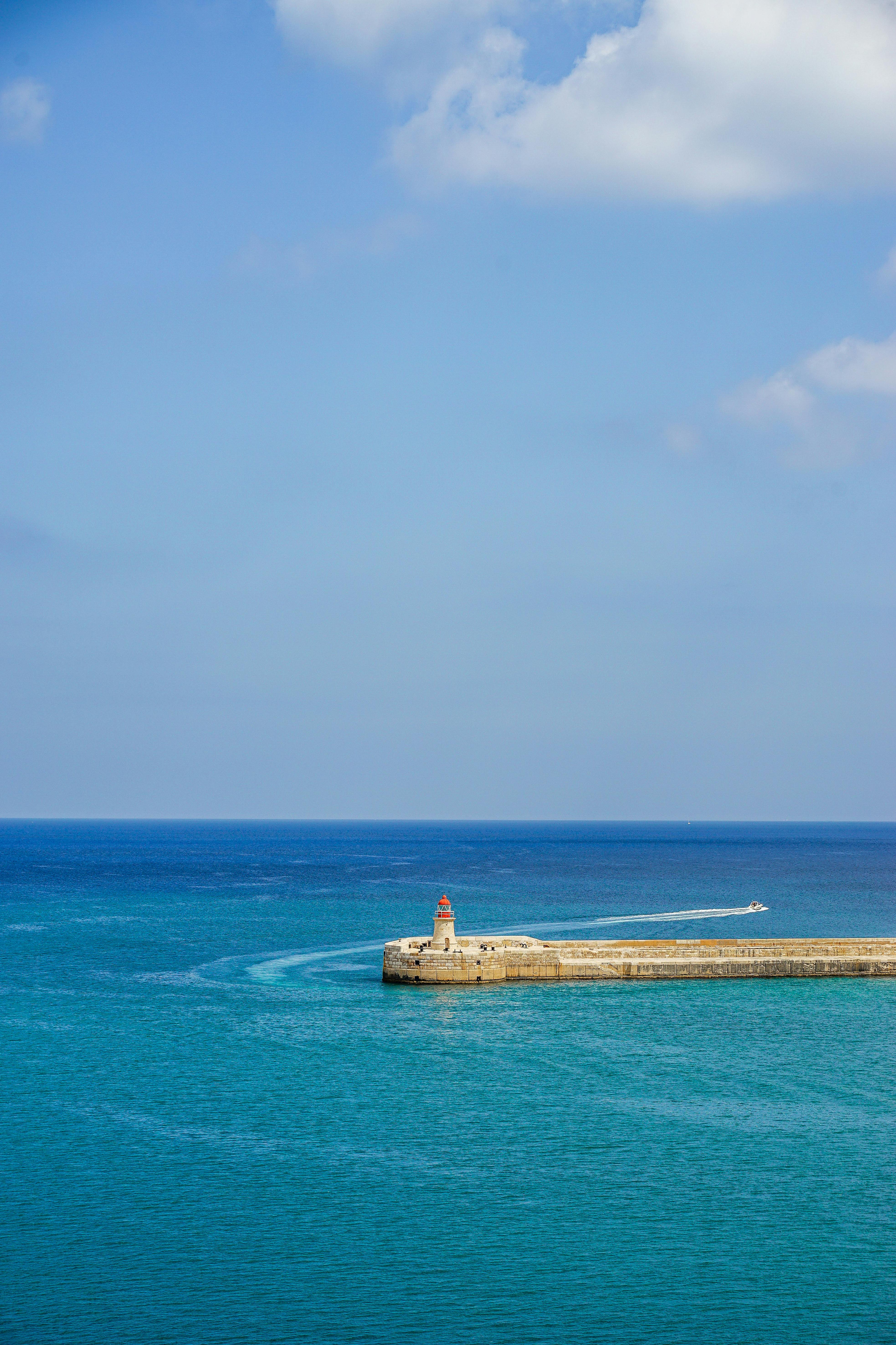 Breakwater With Lighthouse Â· Free Stock Photo