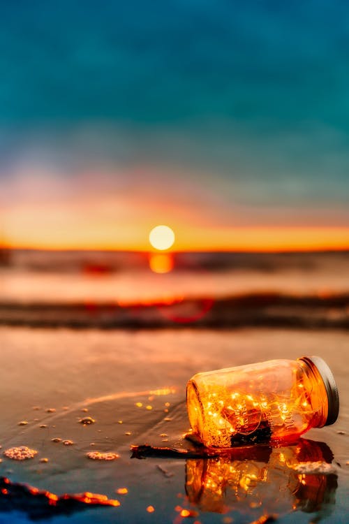Free Orange Mason Jar In Body Of Water Stock Photo