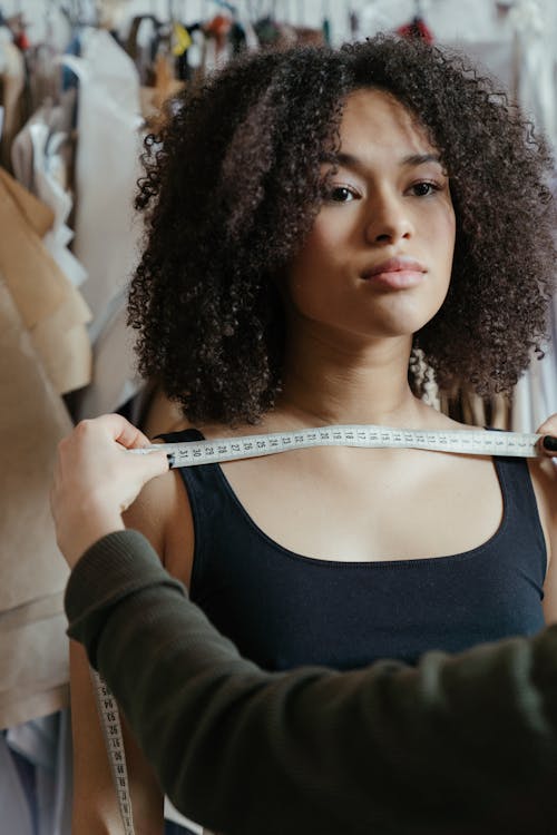 Photo Of Woman Wearing Black Tank Top