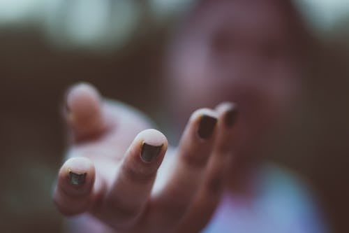 Close-Up Photo Of Person's Hand